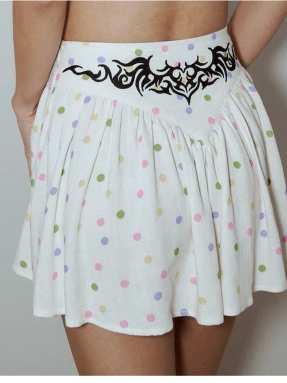 Fashion brand company confetti tramp stamp mini skirt